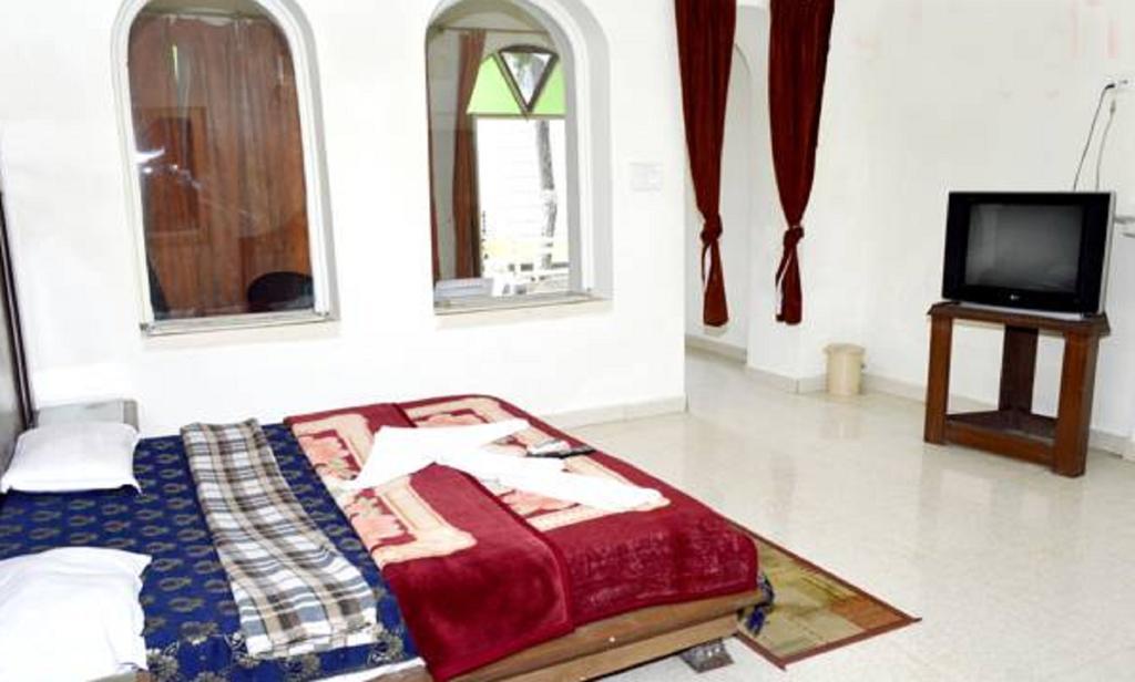 Hotel Bhajgovindam Haridwār Cameră foto